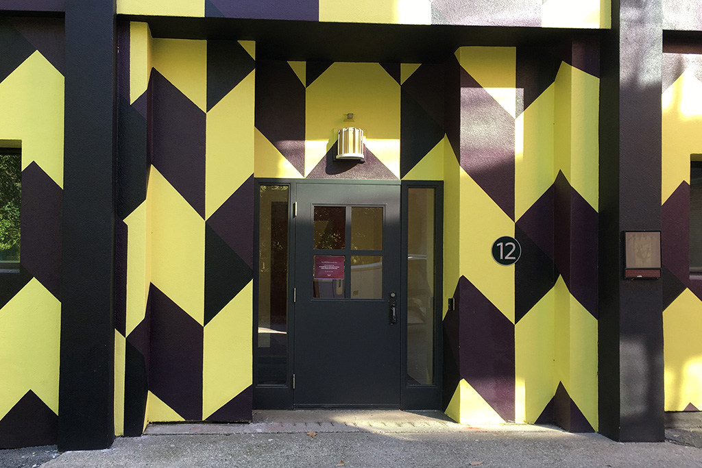 The lower level entrance (nearest the Computer Center) features a single door.