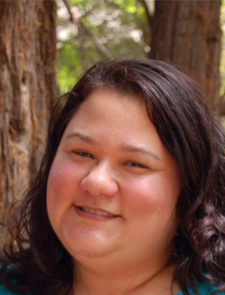 A photo portrait of Erika Lee, a person with long brown hair.